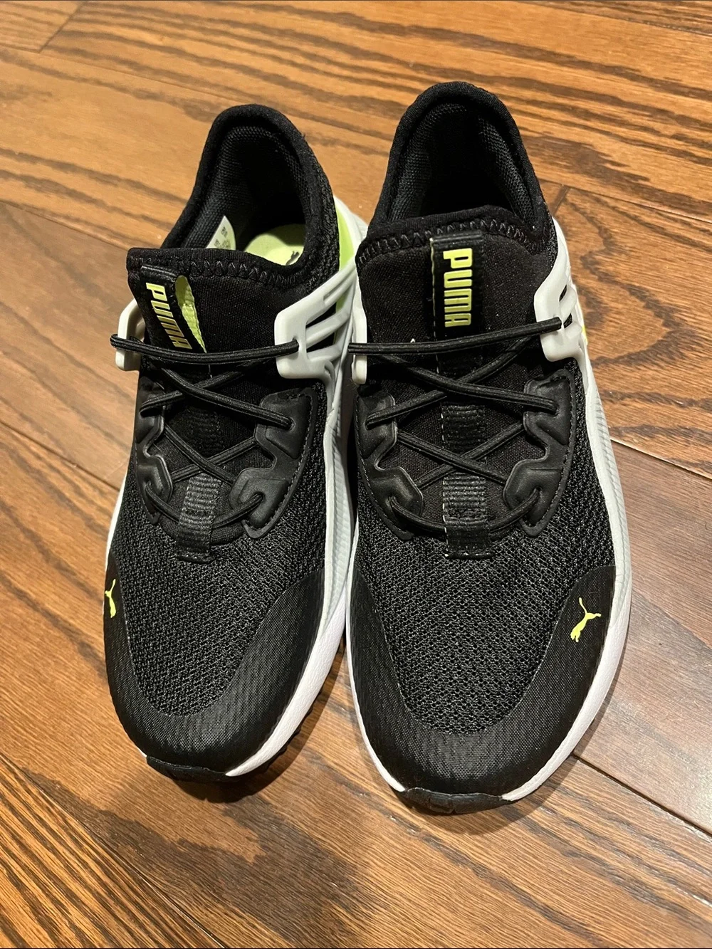 Puma Black Sneakers with Neon Yellow Accents